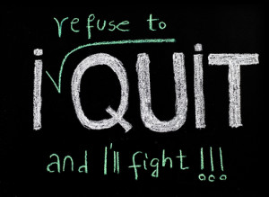 I refuse to quit message, handwriting with chalk on blackboard, lifestyle change concept
